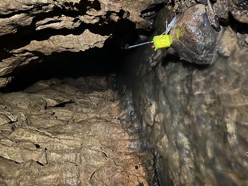 Vangelis node placed by a cave stream